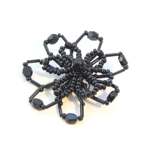 brooch made of black fire polished beads